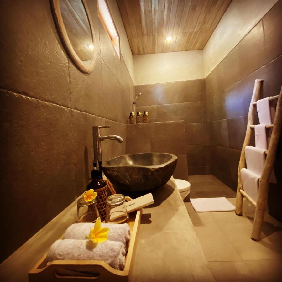 Golden Garuda Cottages Polilit Esterno foto