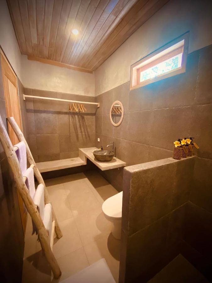 Golden Garuda Cottages Polilit Esterno foto