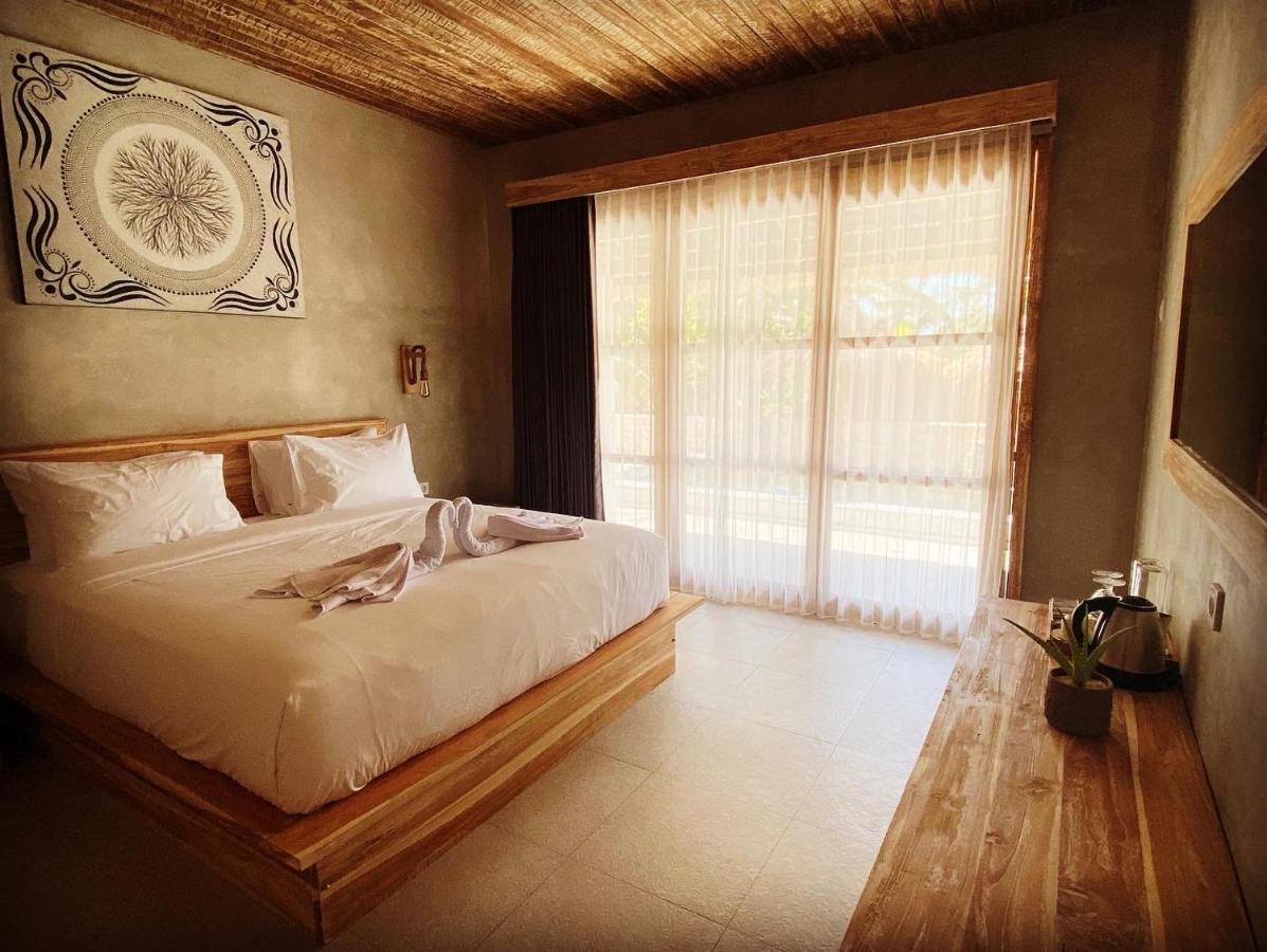 Golden Garuda Cottages Polilit Esterno foto