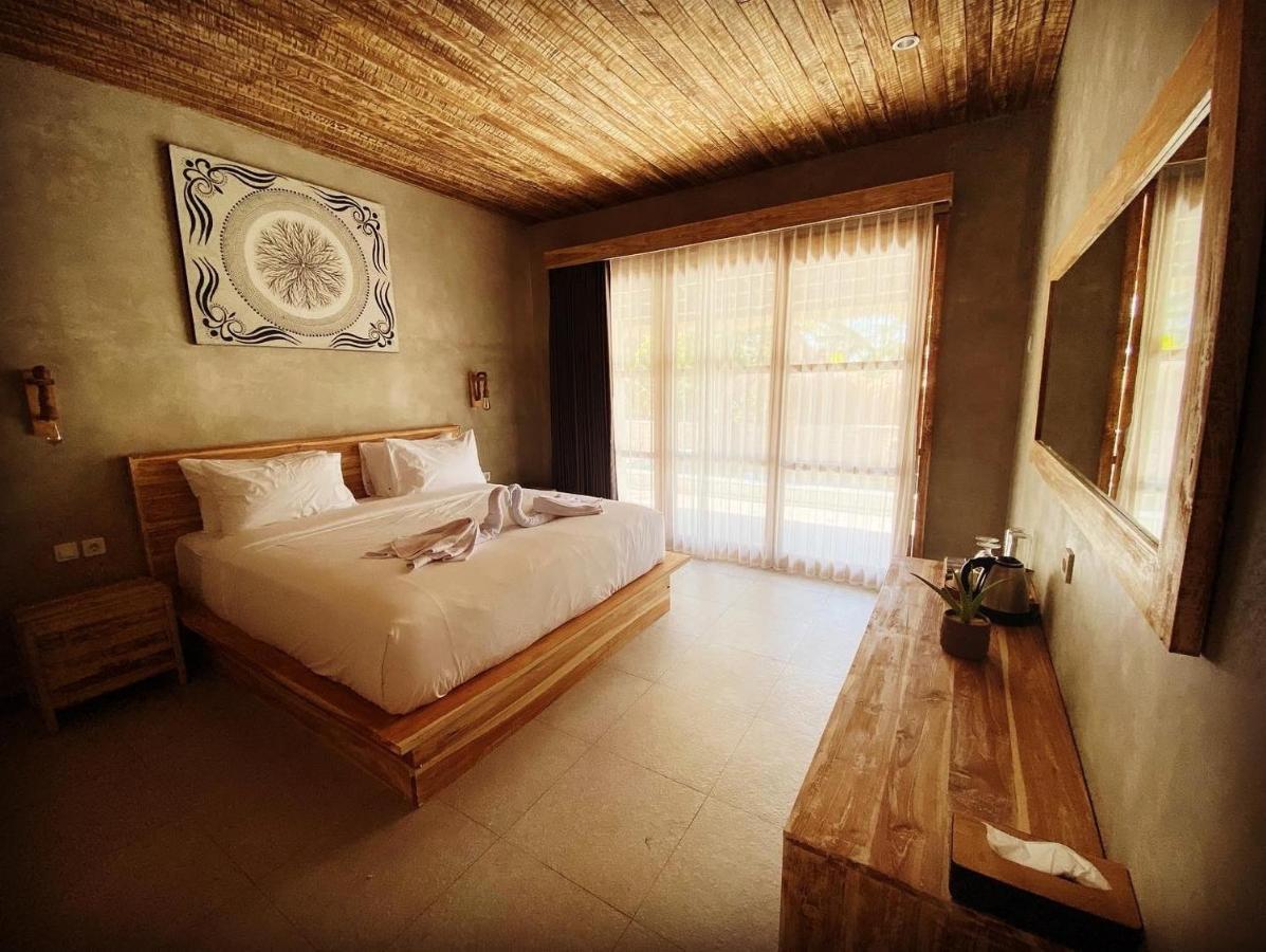 Golden Garuda Cottages Polilit Esterno foto
