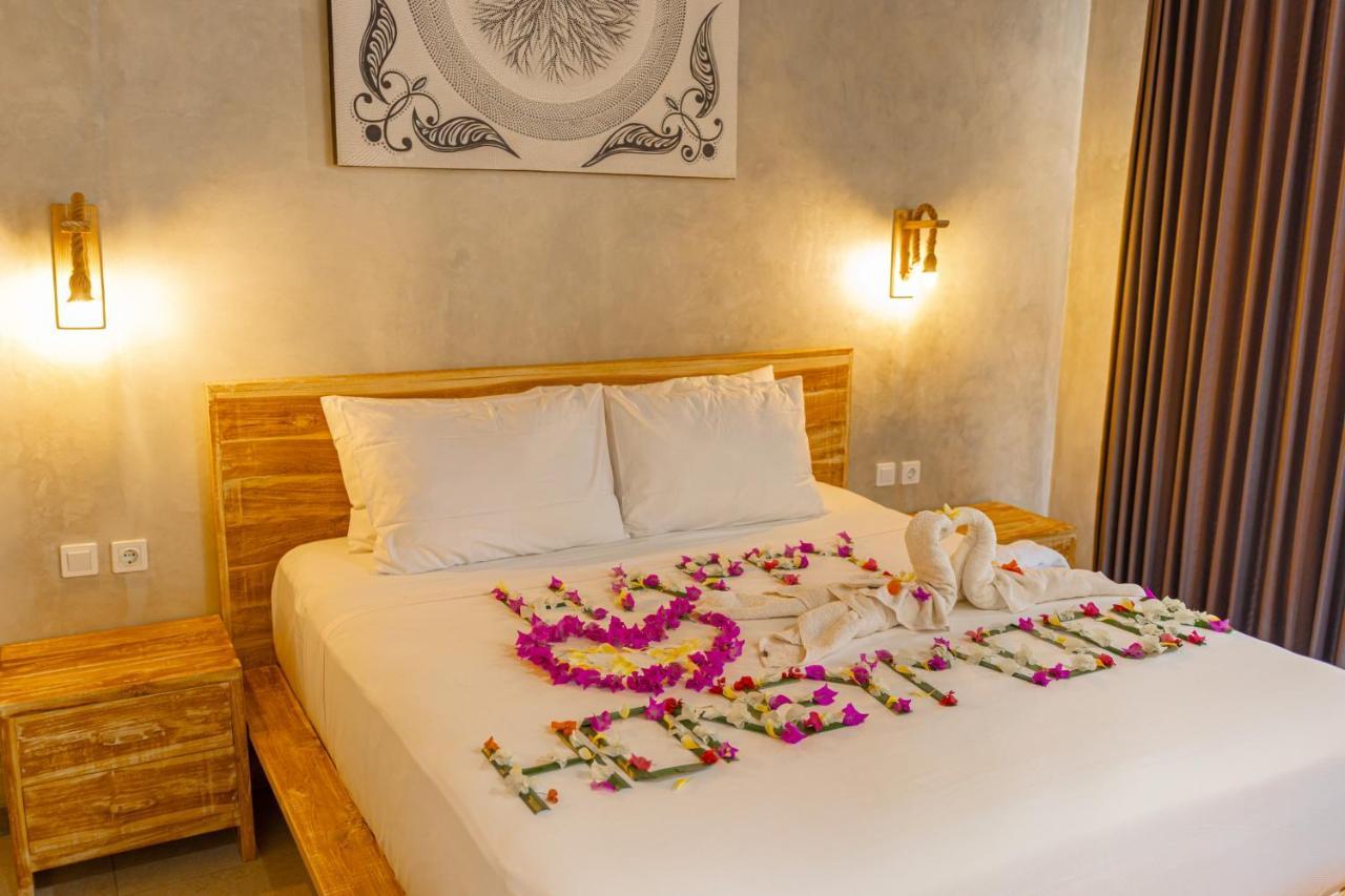 Golden Garuda Cottages Polilit Esterno foto