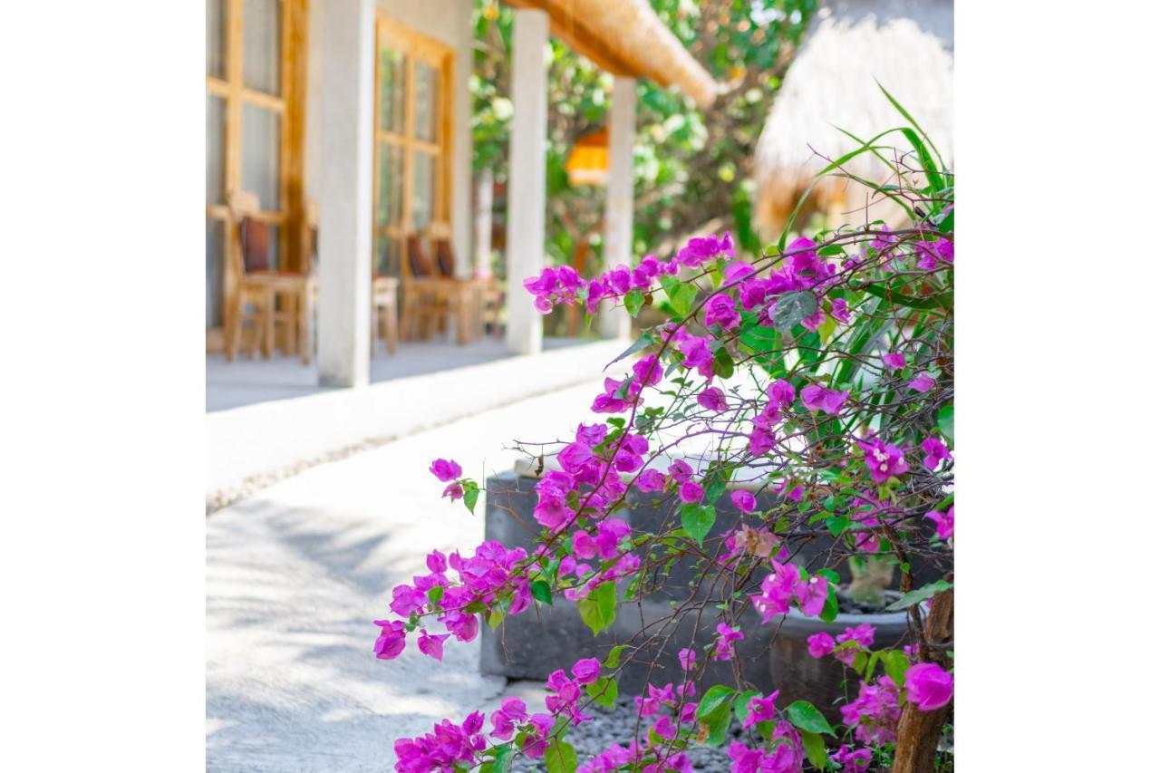 Golden Garuda Cottages Polilit Esterno foto