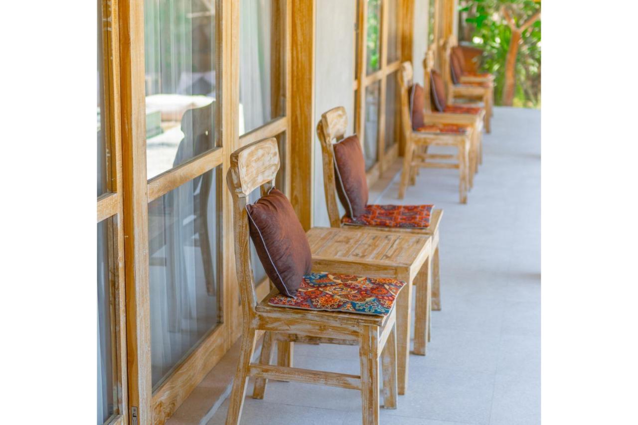 Golden Garuda Cottages Polilit Esterno foto
