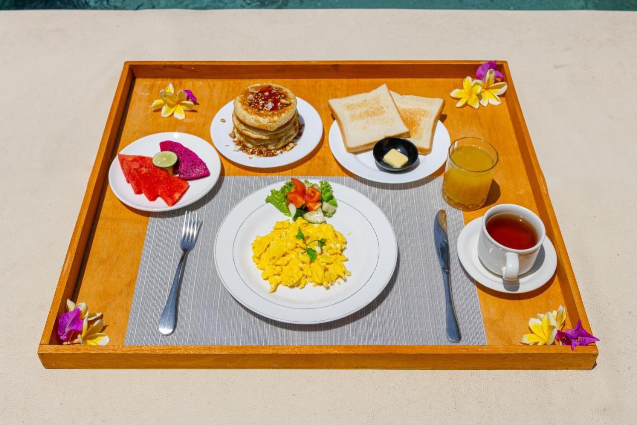 Golden Garuda Cottages Polilit Esterno foto