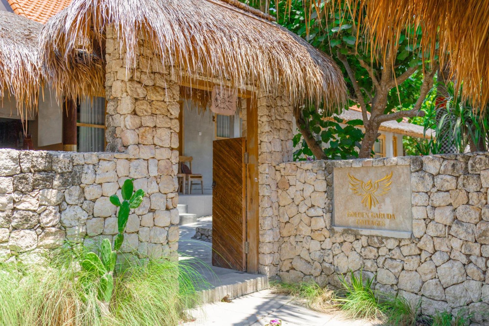 Golden Garuda Cottages Polilit Esterno foto