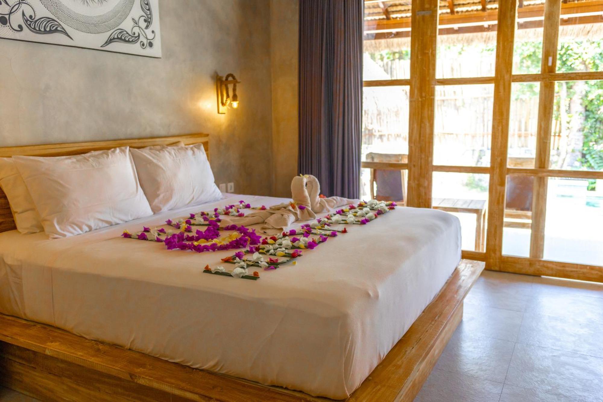 Golden Garuda Cottages Polilit Esterno foto