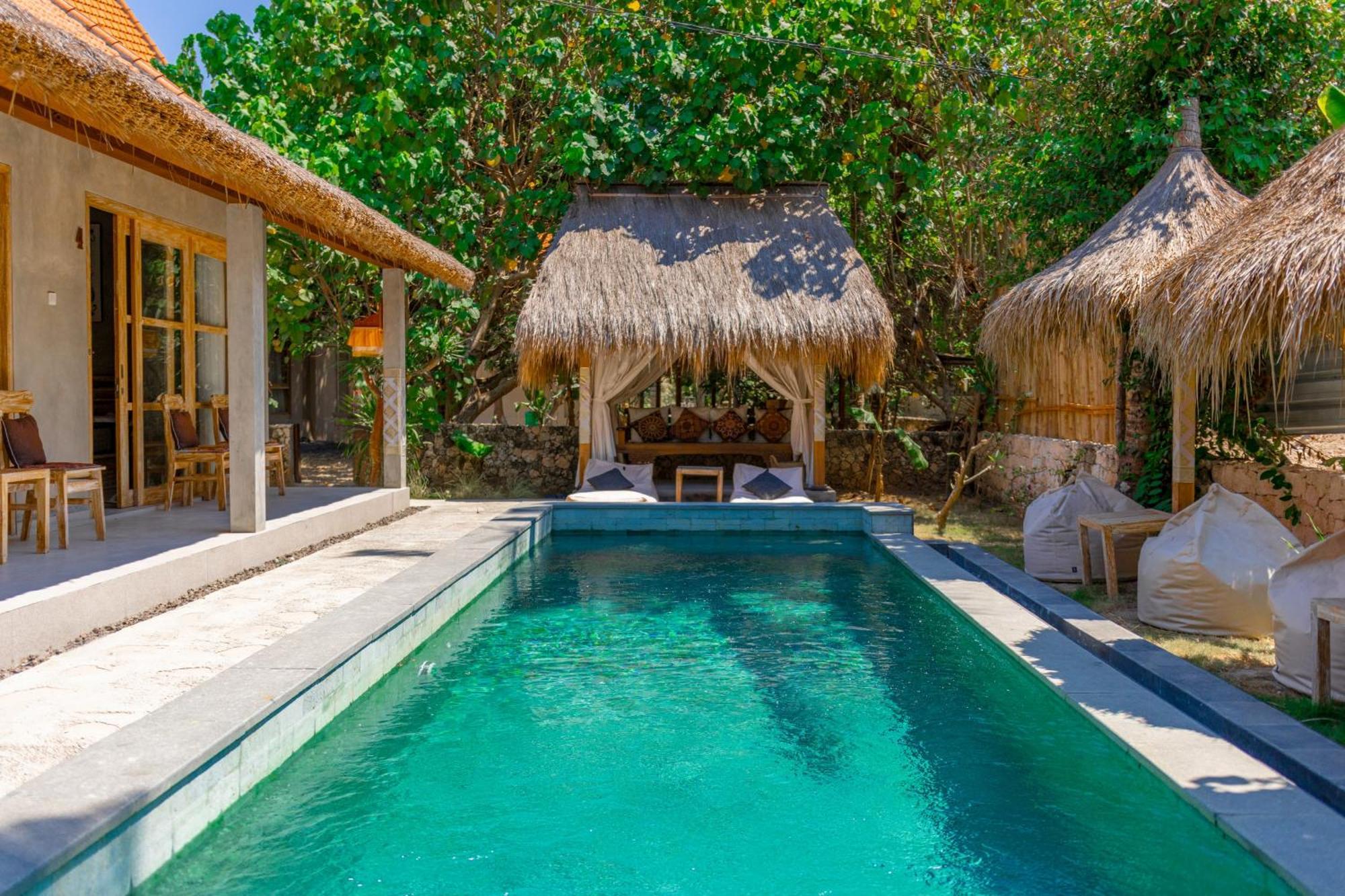 Golden Garuda Cottages Polilit Esterno foto