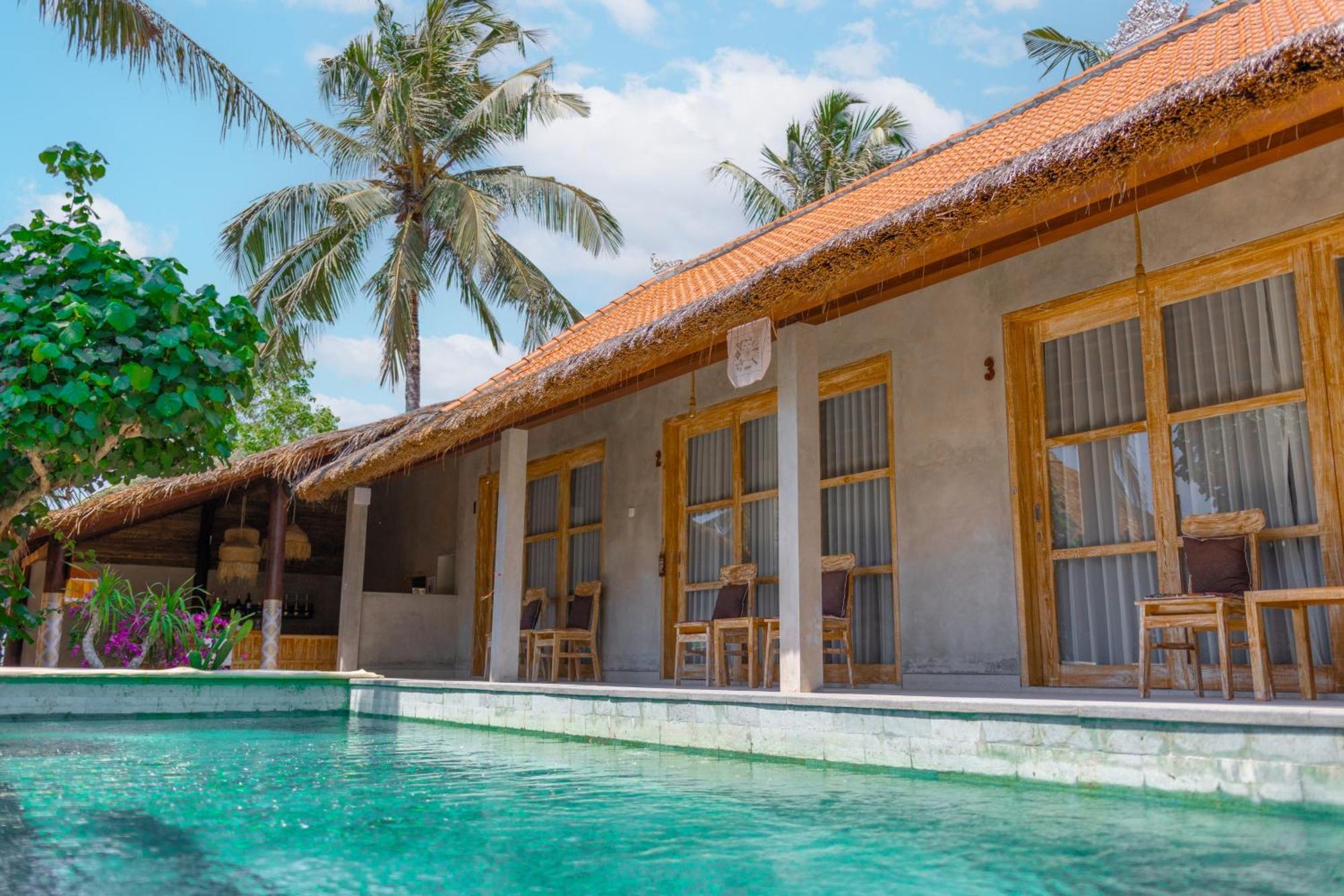 Golden Garuda Cottages Polilit Esterno foto